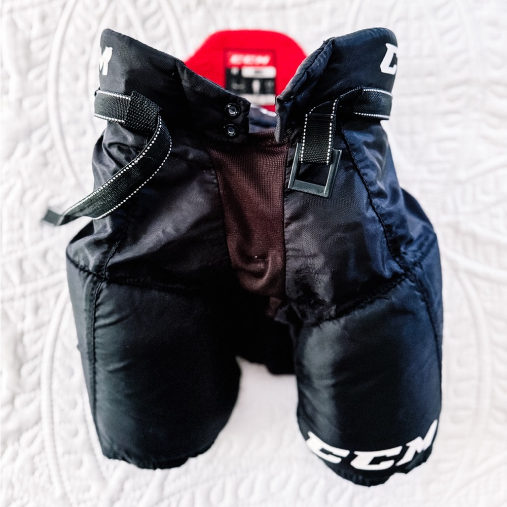 CCM Kids Black and Red Hockey Pants